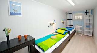 Гостиница Хостел Афины Томск Односпальная кровать в общем номере для мужчин и женщин-1